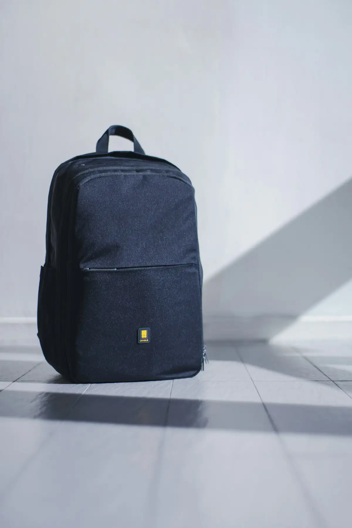 Open suitcase with travel essentials and clothing for different seasons