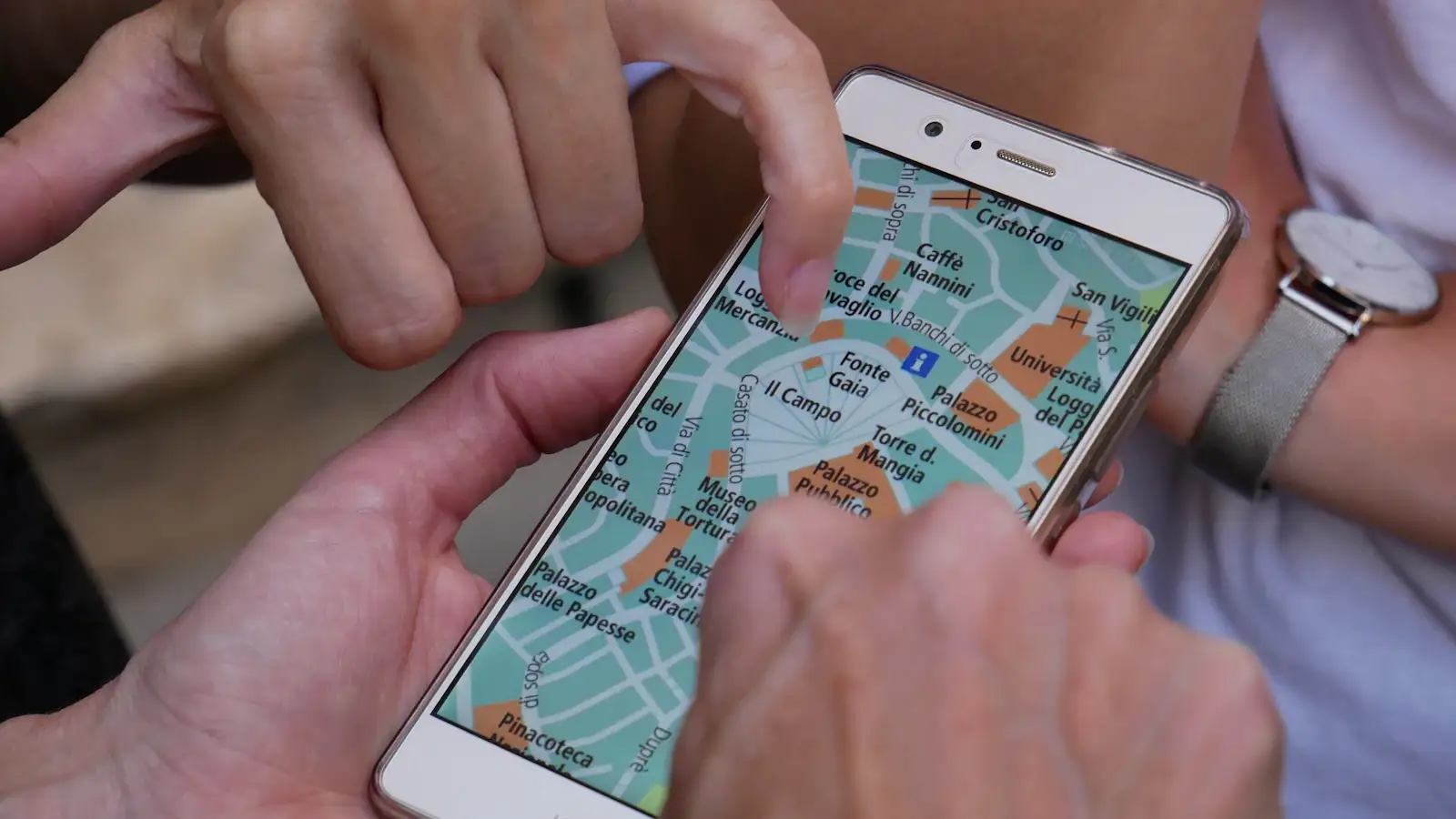 Tourist checking apps on smartphone while planning China trip