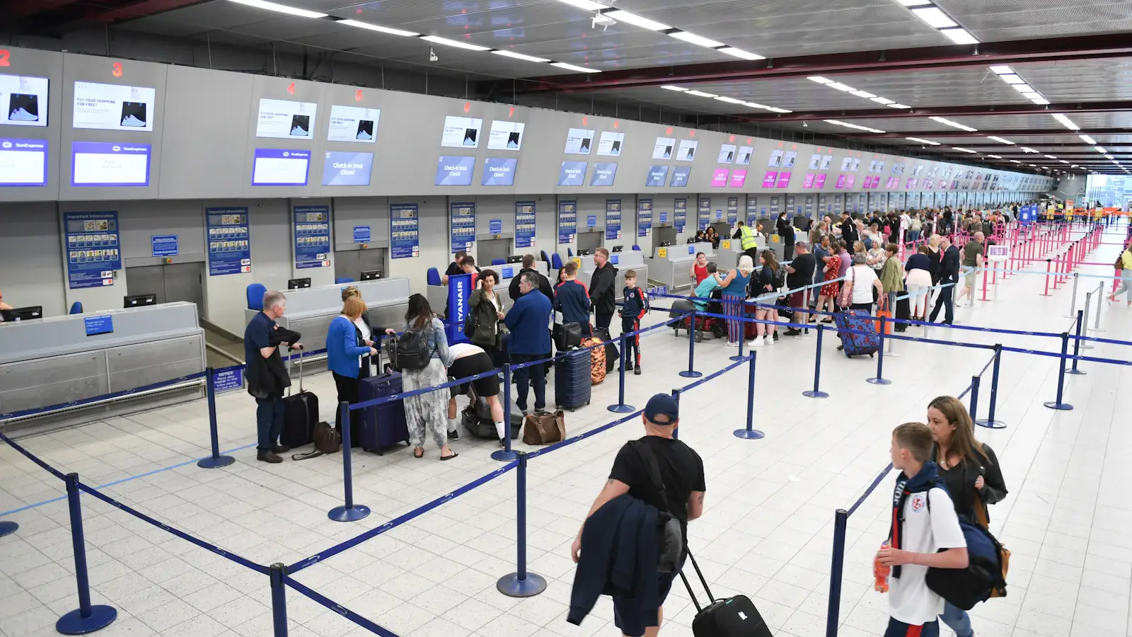 Passport and boarding pass at an immigration counter